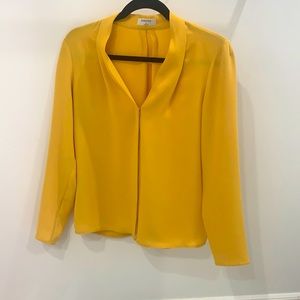 Babaton yellow blouse in size small